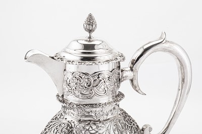 Lot 320 - An Edwardian sterling silver mounted cut glass claret jug, London 1904 by William Comyns