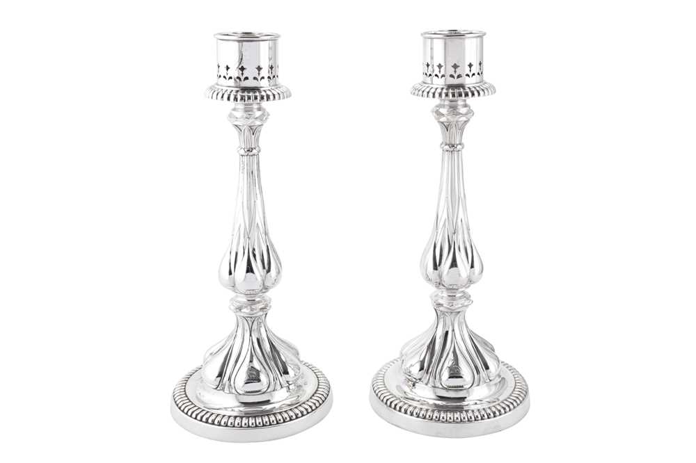Lot 177 - Indian Colonial Parsi interest – A pair of Victorian sterling silver storm candlesticks, Birmingham 1863 by Elkington and Co