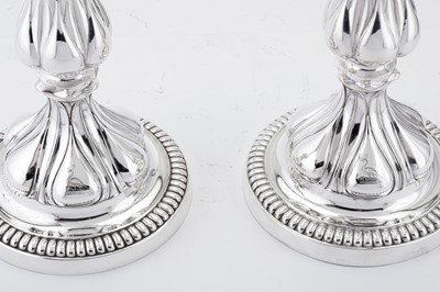 Lot 177 - Indian Colonial Parsi interest – A pair of Victorian sterling silver storm candlesticks, Birmingham 1863 by Elkington and Co
