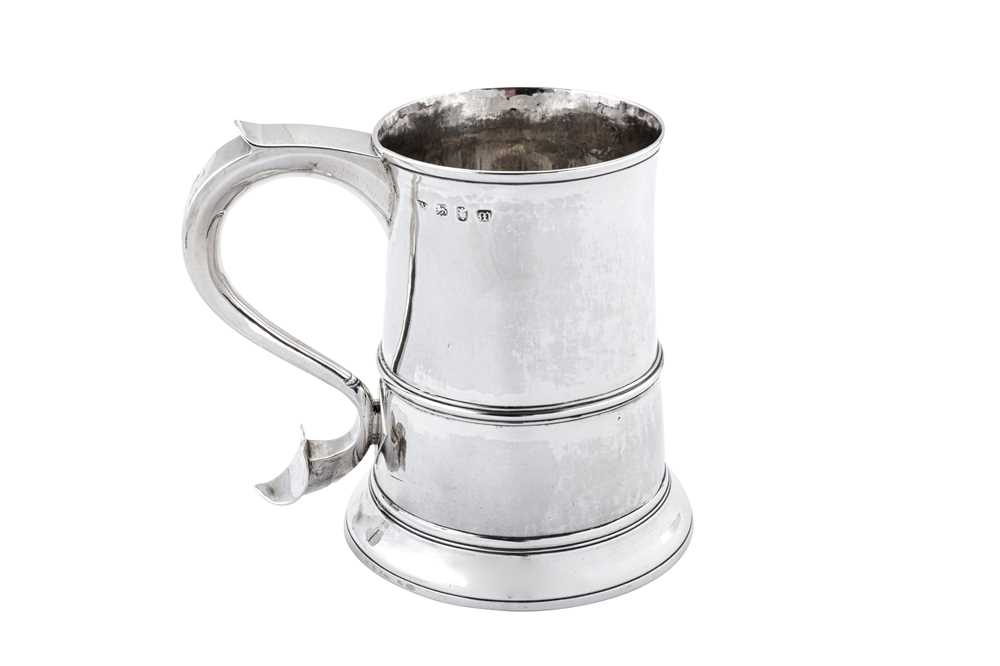 Lot 409 - A George III sterling silver quart mug, London 1767 by Jacob Marsh or John Moore