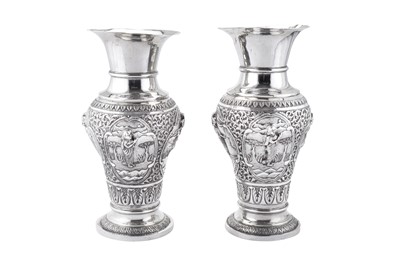 Lot 159 - A pair of mid-20th century Anglo-Indian unmarked silver vases, probably Bombay circa 1940