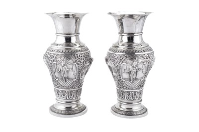 Lot 159 - A pair of mid-20th century Anglo-Indian unmarked silver vases, probably Bombay circa 1940