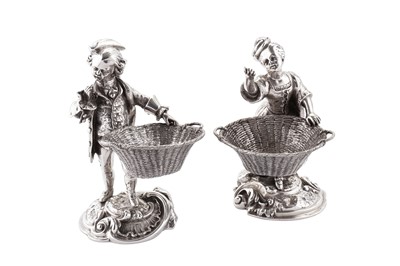 Lot 364 - A heavy pair of Victorian cast sterling silver figural table salts, London 1899 by Edward Barnard & Sons Ltd