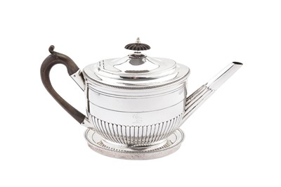 Lot 423 - A George III sterling silver teapot on stand, the teapot London 1802 by Richard Cooke