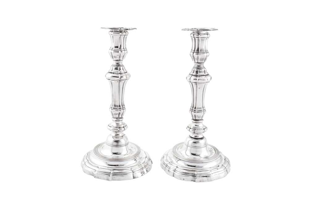 Lot 133 - A pair of Louis XV mid-18th century French provincial silver candlesticks, Arras 1766/67 by Jean-Francois-Hippolite Legay (1738-1788, master 6th June 1761)