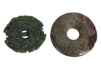 Lot 643 - TWO CHINESE JADE DISCS, BI.