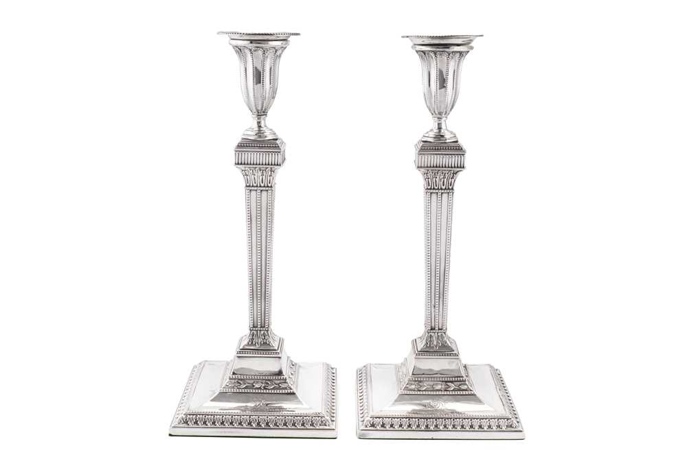 Lot 413 - A pair of George III sterling silver candlesticks, London 1781 by Joseph Steward II (reg. March 1768)