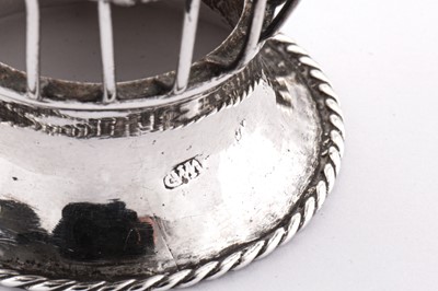Lot 419 - A George III silver cream pail basket, London circa 1770-75 by William Plummer (reg. 8th April 1755)