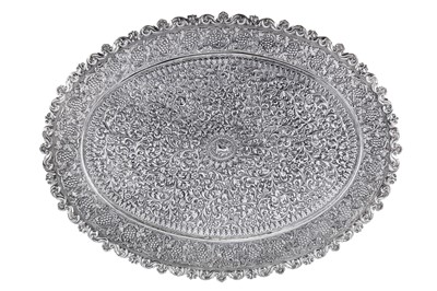 Lot 174 - A late 19th century Anglo – Indian silver tray, Cutch, Bhuj circa 1870 by Oomersi Mawji (active 1860-90)