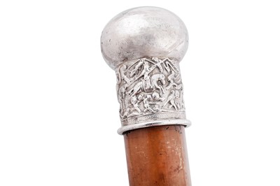 Lot 232 - A late 19th / early 20th century Chinese unmarked silver walking stick, probably Canton circa 1900