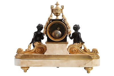 Lot 92 - A MID 19TH CENTURY FRENCH GILT AND PATINATED BRONZE MANTEL CLOCK