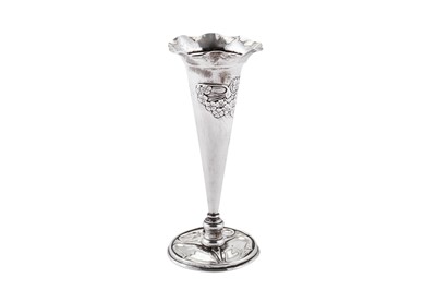 Lot 432 - A late Victorian 'Arts and Crafts' sterling silver flower vase, Birmingham 1899, marked for William Hutton and Son, the design attributed to Kate Harris (active circa 1899-1905)