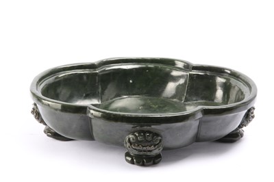 Lot 548 - A LARGE CHINESE SPINACH-GREEN JADE QUATREFOIL JARDINIERE.