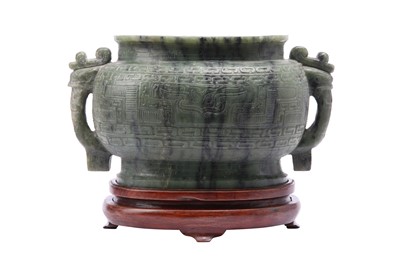 Lot 100 - A MASSIVE CHINESE GREEN JADE ARCHAISTIC VASE.