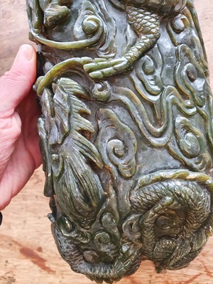 Lot 547 - A MASSIVE CHINESE SPINACH-GREEN JADE WASHER.