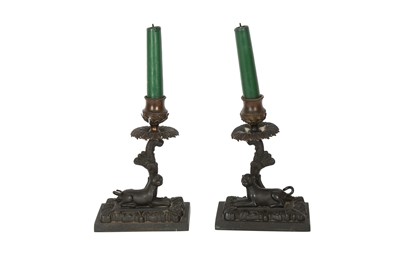 Lot 123 - A PAIR OF REGENCY PATINATED BRONZE CANDLESTICKS