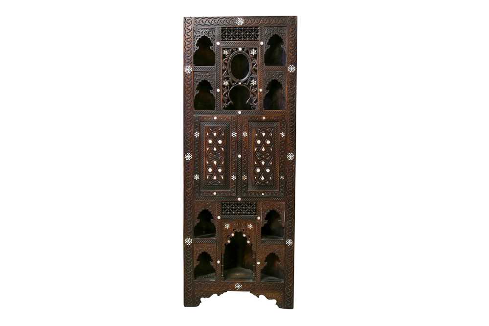 Lot 335 - λ A CARVED HARDWOOD MOTHER-OF-PEARL AND BONE-INLAID CORNER CUPBOARD