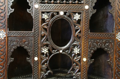 Lot 258 - λ A CARVED HARDWOOD MOTHER-OF-PEARL AND BONE-INLAID CORNER CUPBOARD