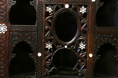 Lot 335 - λ A CARVED HARDWOOD MOTHER-OF-PEARL AND BONE-INLAID CORNER CUPBOARD