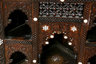 Lot 258 - λ A CARVED HARDWOOD MOTHER-OF-PEARL AND BONE-INLAID CORNER CUPBOARD