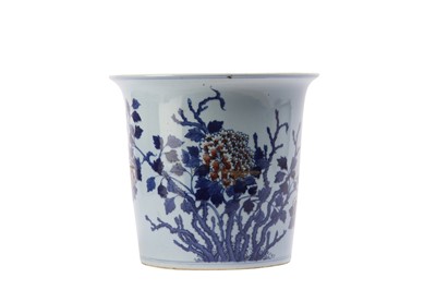 Lot 679 - A CHINESE BLUE AND WHITE AND UNDERGLAZE RED JARDINIERE.