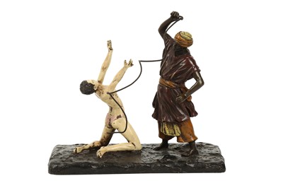Lot 1042 - FRANZ BERGMAN (IN THE MANNER OF) A COLD PAINTED BRONZE MODEL OF A SLAVE TRADER AND NUDE SLAVE