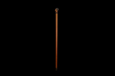 Lot 342 - A LATE 19TH CENTURY MALACCA WALKING CANE CARVED WITH THE HEAD OF A MAN