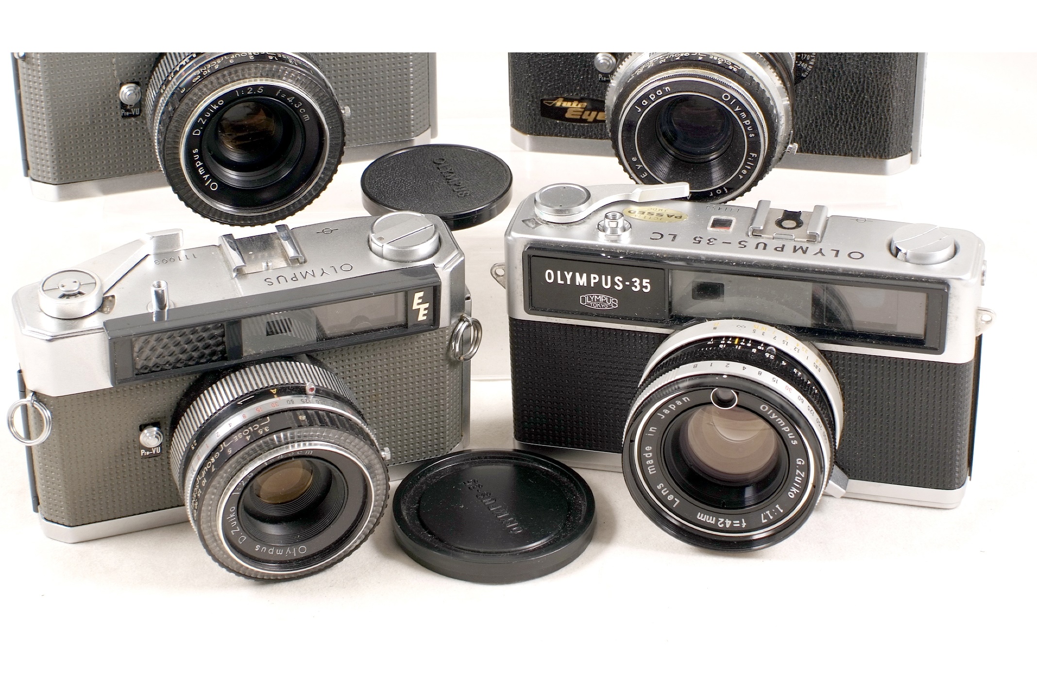 Lot 115 Group of Olympus 35mm Rangefinder Cameras.