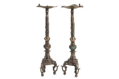 Lot 104 - A PAIR OF 20TH CENTURY SILVERED METAL CHINESE CANDLESTICKS