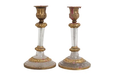 Lot 108 - A PAIR OF 19TH CENTURY FRENCH ROCK CRYSTAL AND ORMOLU MOUNTED CANDLESTICKS