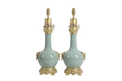 Lot 97 - A PAIR OF LATE 19TH CENTURY CELADON PORCELAIN VASES ADAPTED AS LAMP BASES