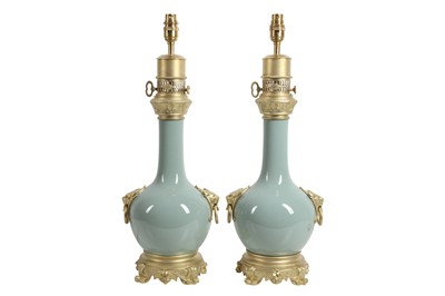Lot 97 - A PAIR OF LATE 19TH CENTURY CELADON PORCELAIN VASES ADAPTED AS LAMP BASES