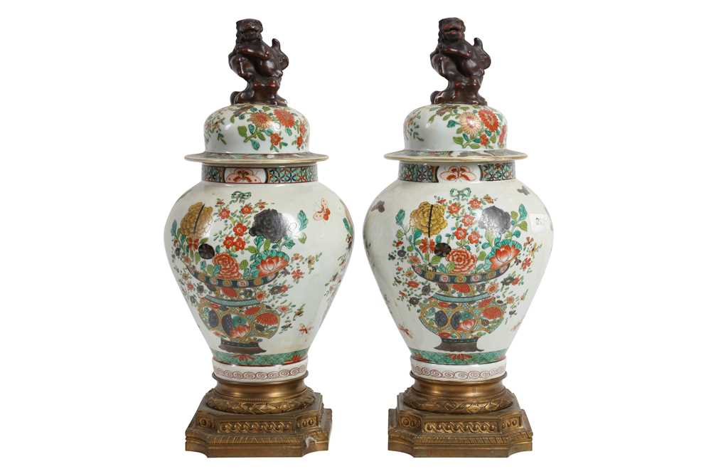 Lot 98 - A PAIR OF LATE 19TH / EARLY 20TH CENTURY GILT BRONZE MOUNTED IMARI PORCELAIN VASES