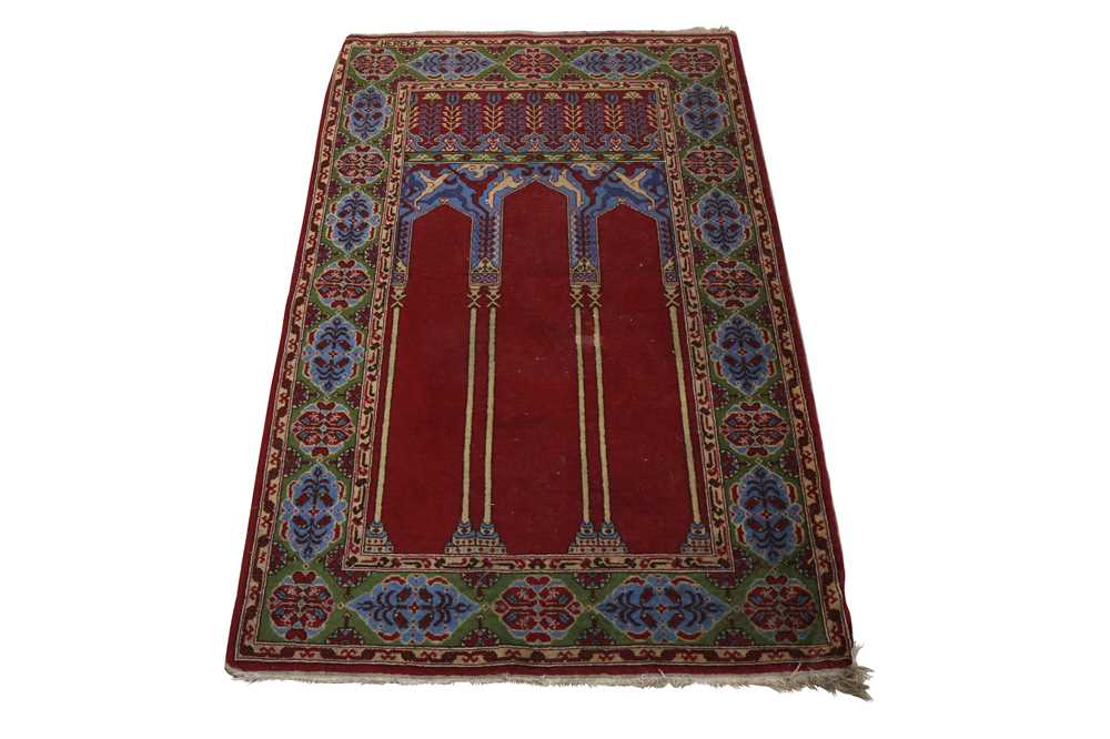 Lot 289 - A HEREKE TRIPLE NICHE PRAYER RUG, TURKEY