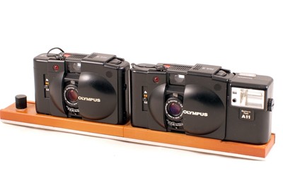 Lot 65 - Twinned & Synchronised Olympus XA2 Cameras for Full Frame Stereo Images.