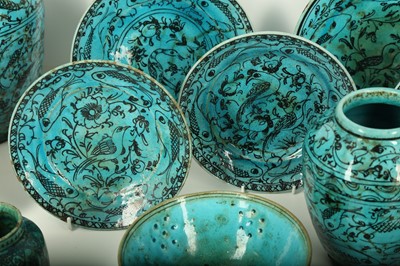 Lot 100 - A GROUP OF TWENTY-ONE BLACK-PAINTED AND TURQUOISE-GLAZED KUBACHI-STYLE POTTERY VESSELS