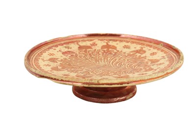 Lot 85 - AN HISPANO-MORESQUE COPPER LUSTRE-PAINTED POTTERY TAZZA
