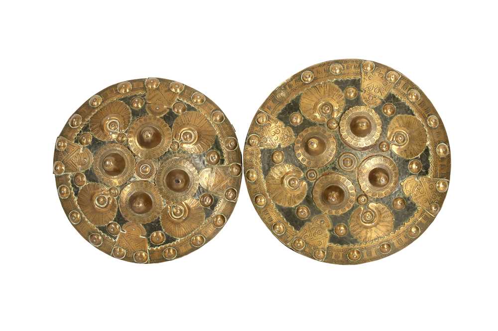 Lot 136 - A PAIR OF TRIBAL INDIAN CEREMONIAL SHIELDS WITH BRASS BOSSES