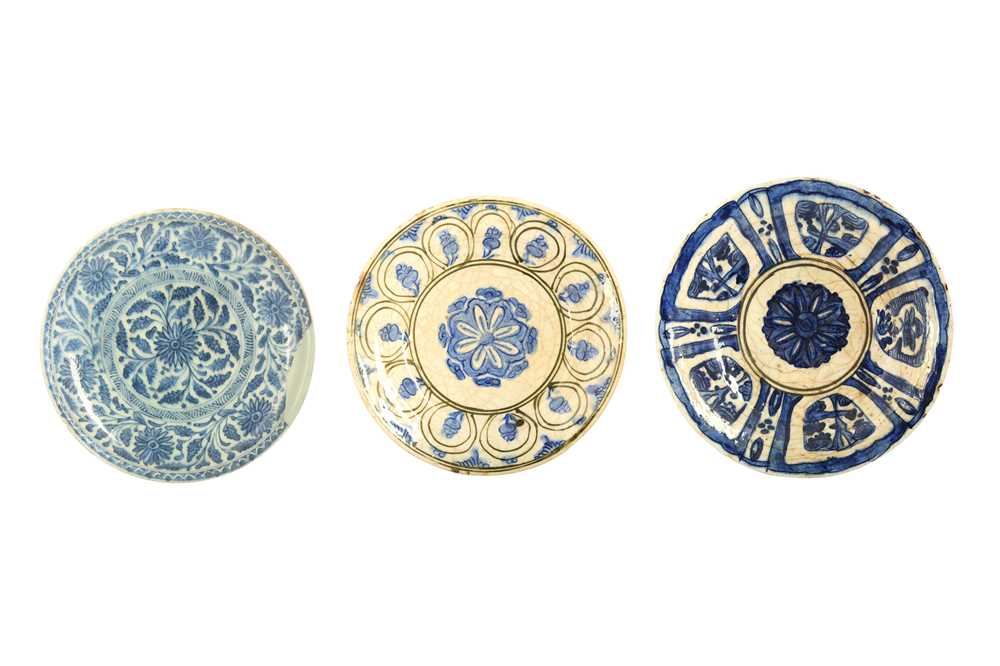 Lot 79 - THREE IRANIAN BLUE AND WHITE POTTERY DISHES