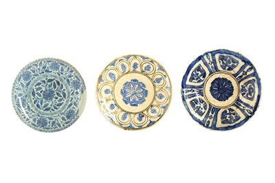 Lot 79 - THREE IRANIAN BLUE AND WHITE POTTERY DISHES