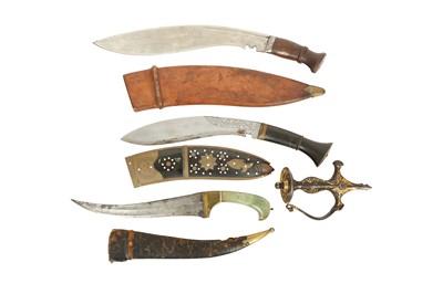 Lot 131 - A GROUP OF THREE INDIAN DAGGERS AND A GOLD-DAMASCENED (KOFTGARI) HILT