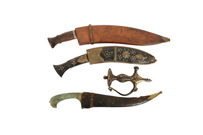 Lot 131 - A GROUP OF THREE INDIAN DAGGERS AND A GOLD-DAMASCENED (KOFTGARI) HILT