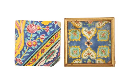 Lot 77 - TWO QAJAR POLYCHROME-PAINTED POTTERY TILES