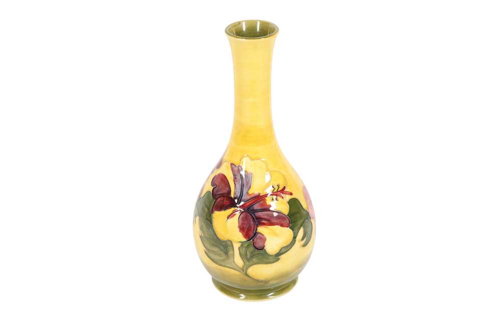 Lot 123 - MOORCROFT, A BOTTLE VASE DECORATED WITH THE HIBISCUS PATTERN