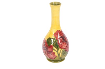 Lot 123 - MOORCROFT, A BOTTLE VASE DECORATED WITH THE HIBISCUS PATTERN