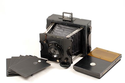 Lot 146 - An Uncommon Ross Panros Folding Strut Press Camera.
