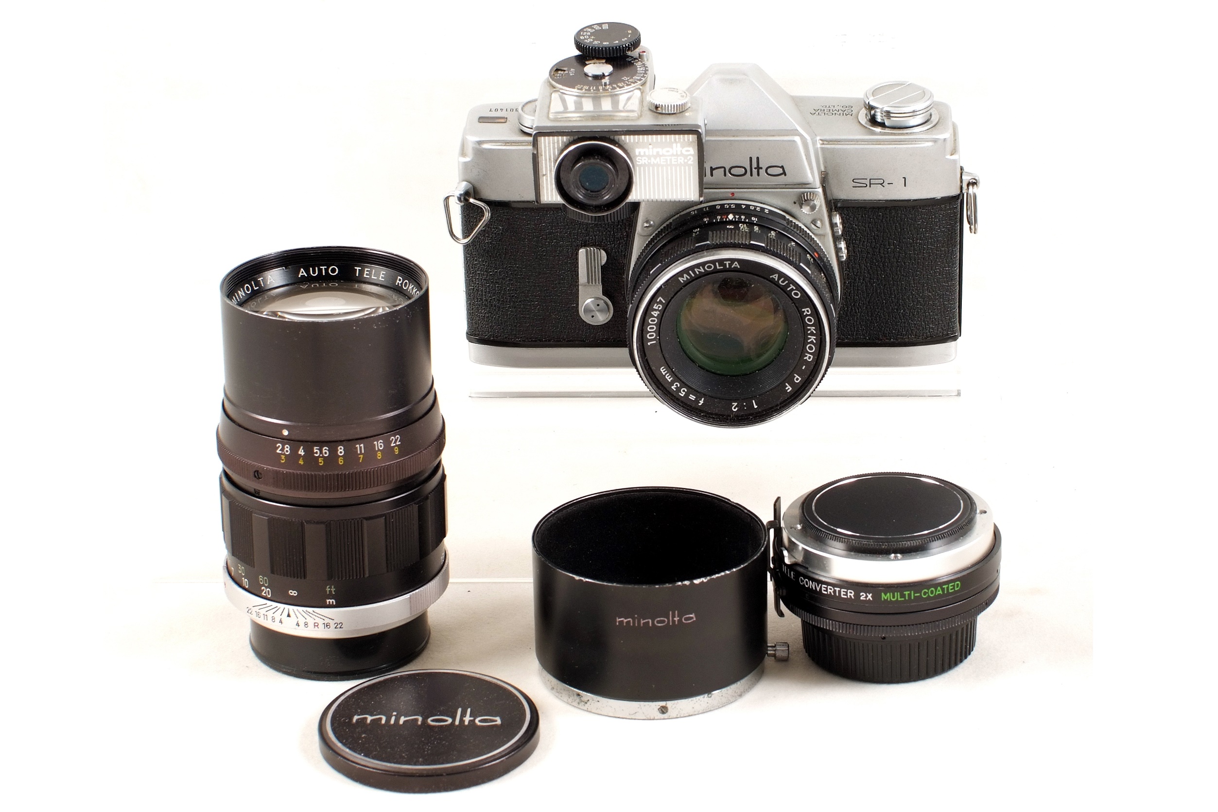 Lot 284 Group of Minolta Film Cameras & Lenses.