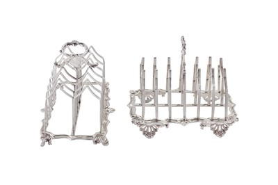 Lot 373 - An assembled pair of William IV sterling silver seven bar toast racks, London 1831/35 by Charles Fox