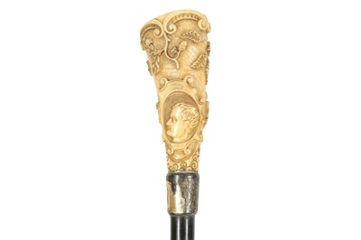 Lot 244 - AN IVORY HANDLED WALKING CANE, 19TH CENTURY