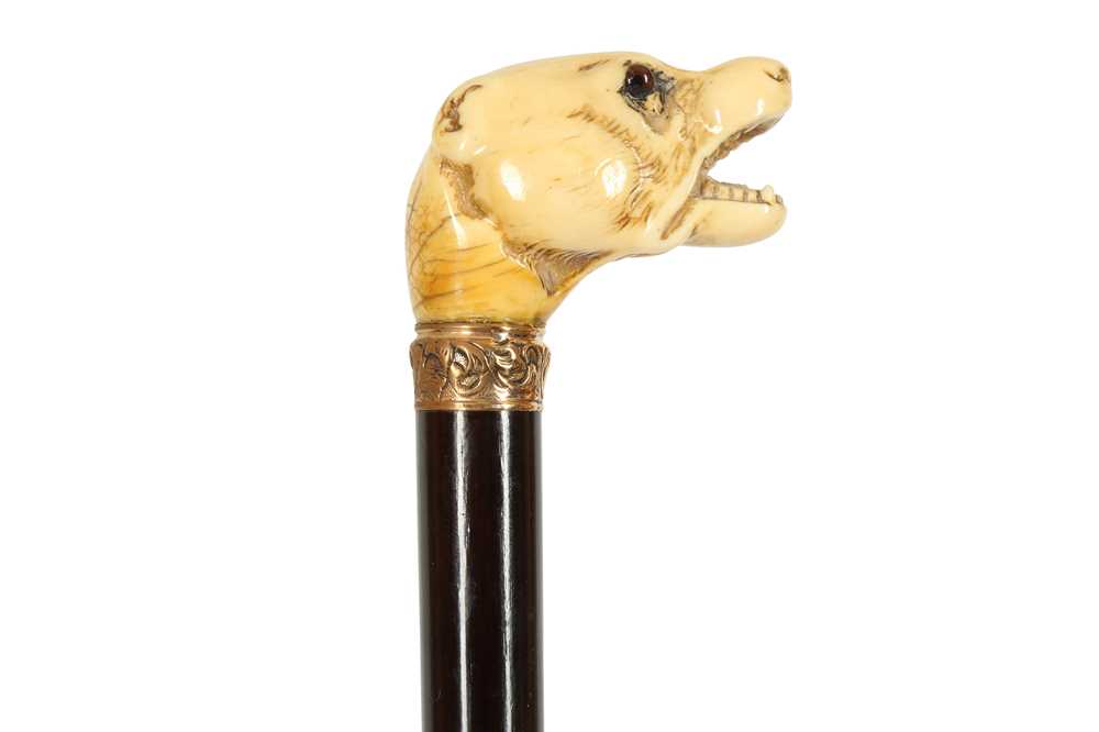 Lot 247 - A MARINE IVORY HANDLED WALKING CANE, 19TH